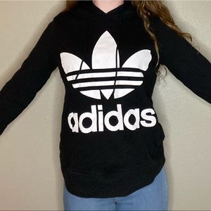 Black adidas hoodie.